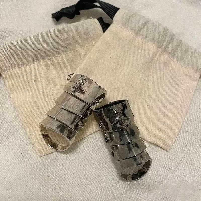 Multiple views of NANA Armour Ring showing front, side, and inner curve details